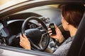 Woman using breath alcohol analyzer in the car Royalty Free Stock Photo