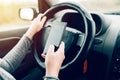 Woman using car navigation on smartphone Royalty Free Stock Photo