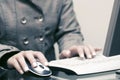 Woman using computer mouse and keyboard Royalty Free Stock Photo