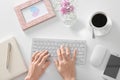 Woman using computer at white table, top view Royalty Free Stock Photo