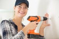 woman using cordless screwdriver Royalty Free Stock Photo