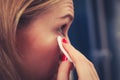 Woman using cotton pad to remove make up Royalty Free Stock Photo