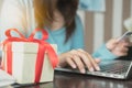 Woman using credit card shopping gifts via online and pay bills via internet banking by computer Royalty Free Stock Photo