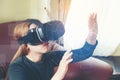 Woman Using 3-D glasses in virtual reality glasses or headset Royalty Free Stock Photo
