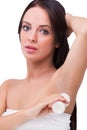 Woman using deodorant Royalty Free Stock Photo