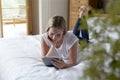 Woman using digital tablet at home Royalty Free Stock Photo