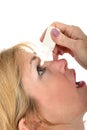 Woman Using Eye Drops