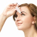 Woman using eye drops. Medicine treatment. Eyecare human problem. Ophtalmology