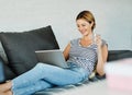 woman laptop sofa computer home technology young internet communication girl sitting Royalty Free Stock Photo