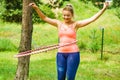 Young woman with hoola hoop outdoors Royalty Free Stock Photo