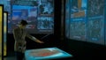 Woman using interactive display at modern history museum