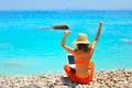 Woman using laptop on the beach Royalty Free Stock Photo