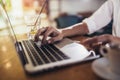 Woman using a laptop, hands close up Royalty Free Stock Photo