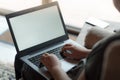 Woman using laptop computer in house Royalty Free Stock Photo