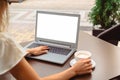 Woman using laptop with empty screen copyspace. Royalty Free Stock Photo