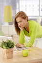 Woman using laptop at home Royalty Free Stock Photo