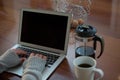 Woman using laptop in kitchen Royalty Free Stock Photo