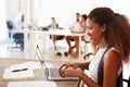 Woman Using Laptop In Modern Office Of Start Up Business Royalty Free Stock Photo