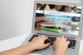 Woman using laptop for online studying, closeup. Adult education