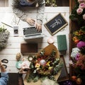 Woman Using Laptop Searching on Internet to Shop Flowers Plants