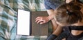 woman using laptop or tablet in bed white empty screen for copy space Royalty Free Stock Photo