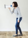 Woman using megaphone for announcement