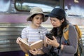 Woman using mobile phone while travel by train. travel concept Royalty Free Stock Photo