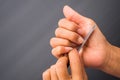 Woman using nail file for manicure and treatment Royalty Free Stock Photo