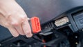 Woman using OBD2 diagnostic scanner. Royalty Free Stock Photo
