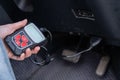 Woman using OBD2 diagnostic scanner. Royalty Free Stock Photo