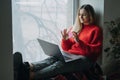 Woman using online dating app on laptop. Valentines Day, dating, meeting During The Coronavirus Outbreak. Love at Royalty Free Stock Photo