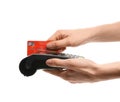 Woman using payment terminal on white background Royalty Free Stock Photo