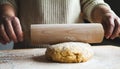 Woman using rolling pin, preparing dough for pizza, bread, pie or Christmas cookies. Royalty Free Stock Photo