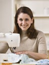 Woman Using Sewing Machine Royalty Free Stock Photo