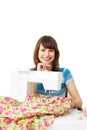 Woman using sewing machine Royalty Free Stock Photo