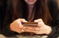 Woman using smart mobile phone on the table, Shopping and Communicating with digital technology. Modern Trend, Lifestyle, Business Royalty Free Stock Photo