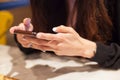 Woman using smart mobile phone on the table, Shopping and Communicating with digital technology. Modern Trend, Lifestyle, Business Royalty Free Stock Photo