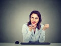 Woman using a smart phone voice recognition function on line sitting at table Royalty Free Stock Photo