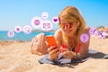 Woman using smartphone on beach Royalty Free Stock Photo