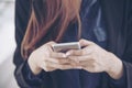 Woman using smartphone shopping online and call with technology lifestyle. Smiling face of asian woman holding cellphone with E- Royalty Free Stock Photo