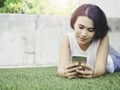 Woman using smartphone with smiling. Royalty Free Stock Photo