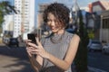 Woman using smartphone to make video call