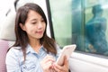 Woman using smartphone and travel on mobile phone Royalty Free Stock Photo