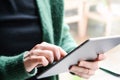 Young trendy woman using tablet device at home Royalty Free Stock Photo