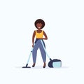 Woman using vacuum cleaner african american housewife cleaning service housework floor care concept flat full length Royalty Free Stock Photo