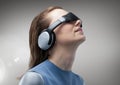 Woman using virtual reality headset Royalty Free Stock Photo