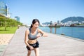Woman using wearable watch when running