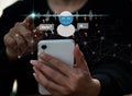 Woman utilizing a smart phone with a digital chatbot on a virtual screen and data in an internet network. AI Artificial