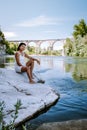 Woman on vacation in Ardeche France, view of the village of Vogue in Ardeche. France Royalty Free Stock Photo
