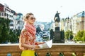 Woman on Vaclavske namesti in Prague Czech Republic sightseeing